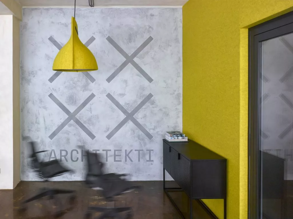 Atelier 2020 architekti with yellow and light grey wall